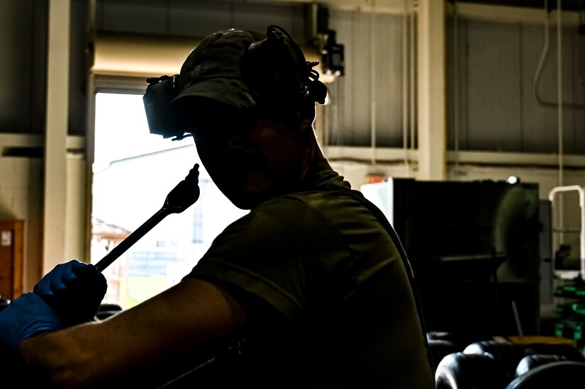 U.S. Air Force Senior Airman Colton Corder, 305th Maintenance Squadron crew chief, performs wheel maintenance at Joint Base McGuire-Dix-Lakehurst, N.J. on Aug. 26, 2022. Crew Chiefs in the Wheel and Tire Section of 305 MXS are validating their local ability to breakdown and build-up tire assemblies for the KC-46's main landing gear and nose landing gear. At the beginning of August 2022, the Air Force Life Cycle Management Center authorized Main Operating Bases to stand up organic tire change capability. A four member team consisting of Crew Chiefs, Sheet Metal, and Nondestructive Inspection went to Altus Air Force Base for initial training and familiarization. By validating local ability to breakdown and build-up tire assemblies for the KC-46, the 305th MXS brings a new capability to JB MDL and will be able to improve support for the KC-46 throughout the Air Force. (U.S. Air Force photo by Senior Airman Matt Porter)