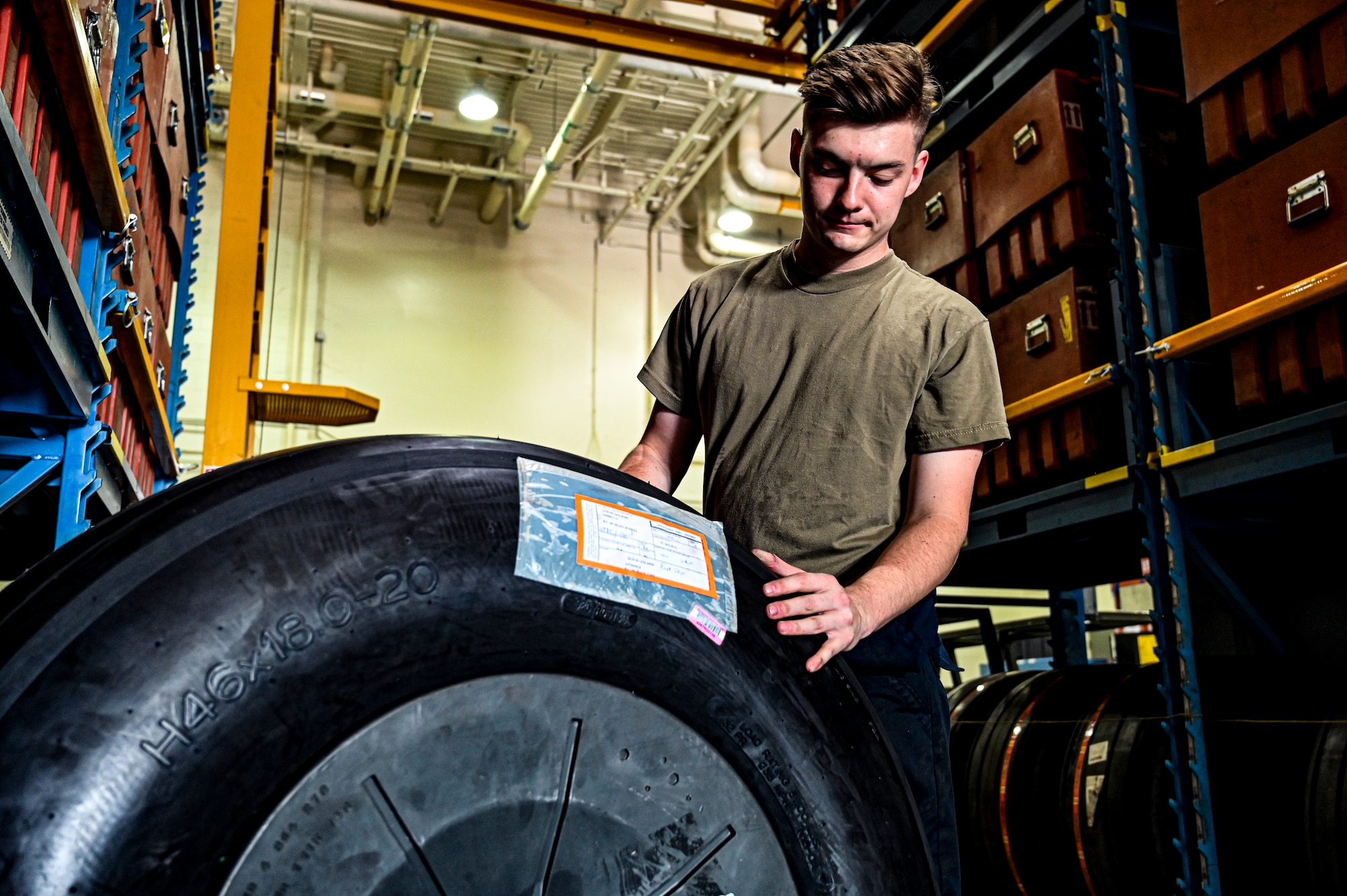 U.S. Air Force Airman First Class Haydon Gould, 305th Maintenance Squadron crew chief, performs a wheel inspection at Joint Base McGuire-Dix-Lakehurst, N.J. on Aug. 26, 2022. Crew Chiefs in the Wheel and Tire Section of 305 MXS are validating their local ability to breakdown and build-up tire assemblies for the KC-46's main landing gear and nose landing gear. At the beginning of August 2022, the Air Force Life Cycle Management Center authorized Main Operating Bases to stand up organic tire change capability. A four member team consisting of Crew Chiefs, Sheet Metal, and Nondestructive Inspection went to Altus Air Force Base for initial training and familiarization. By validating local ability to breakdown and build-up tire assemblies for the KC-46, the 305th MXS brings a new capability to JB MDL and will be able to improve support for the KC-46 throughout the Air Force. (U.S. Air Force photo by Senior Airman Matt Porter)