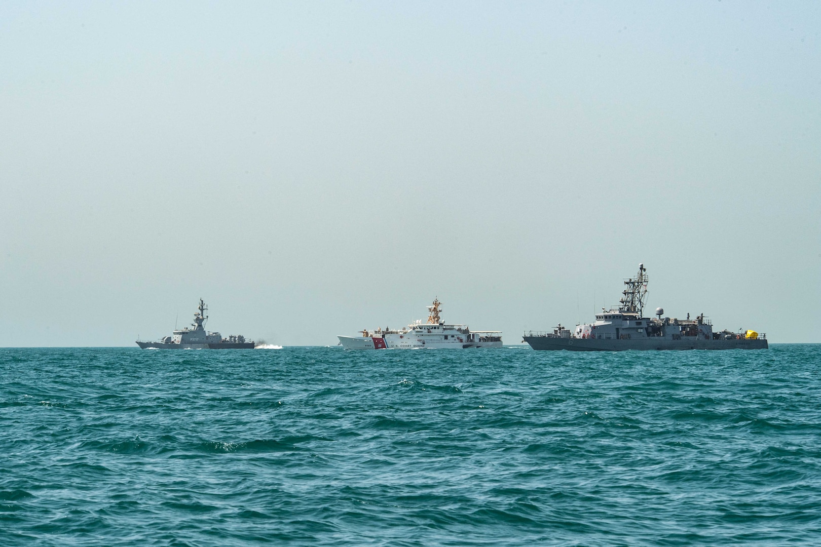 220825-N-ZA692-2883 ARABIAN GULF (Aug. 25, 2022) From the right, U.S. Navy coastal patrol ship USS Sirocco (PC 6), U.S. Coast Guard fast response cutter USCGC Charles Moulthrope (WPC 1141) and Kuwait Naval Forces ship Maskan (P3717), sail in formation during a joint patrol in the Arabian Gulf, Aug. 25. Trilateral engagements help strengthen partnerships and ensure maritime stability and security in the Middle East region.