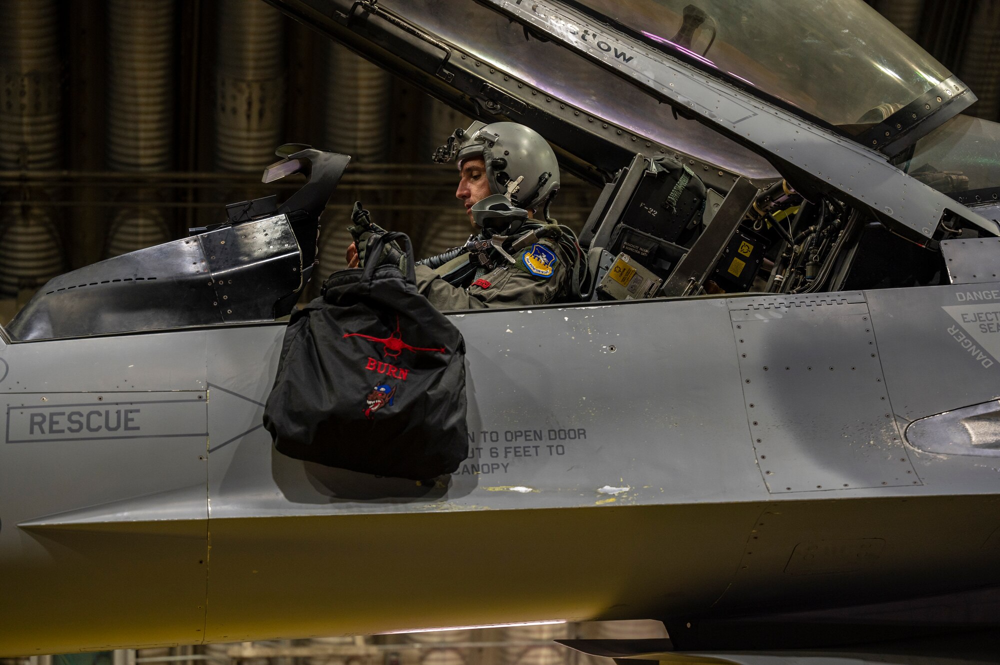 Maj. Nicholas De Wulf, 36th Fighter Squadron pilot, performs pre-flight checks on an F-16 Fighting Falcon prior to a training sortie at Osan Air Base, Republic of Korea, Aug. 15, 2022.