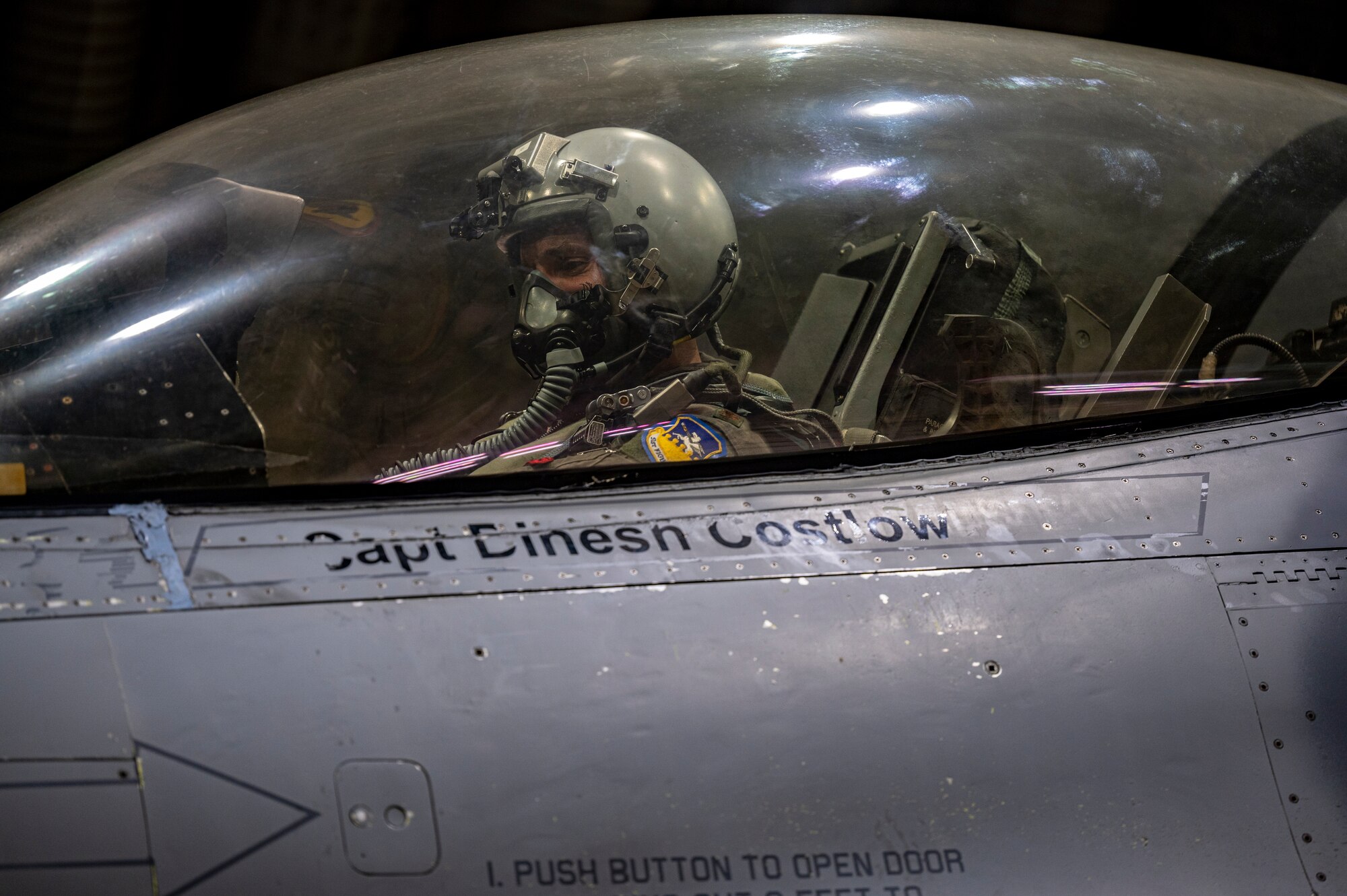 Maj. Nicholas De Wulf, 36th Fighter Squadron pilot, performs pre-flight checks on an F-16 Fighting Falcon prior to a training sortie at Osan Air Base, Republic of Korea, Aug. 15, 2022 in support of a base-wide training event.