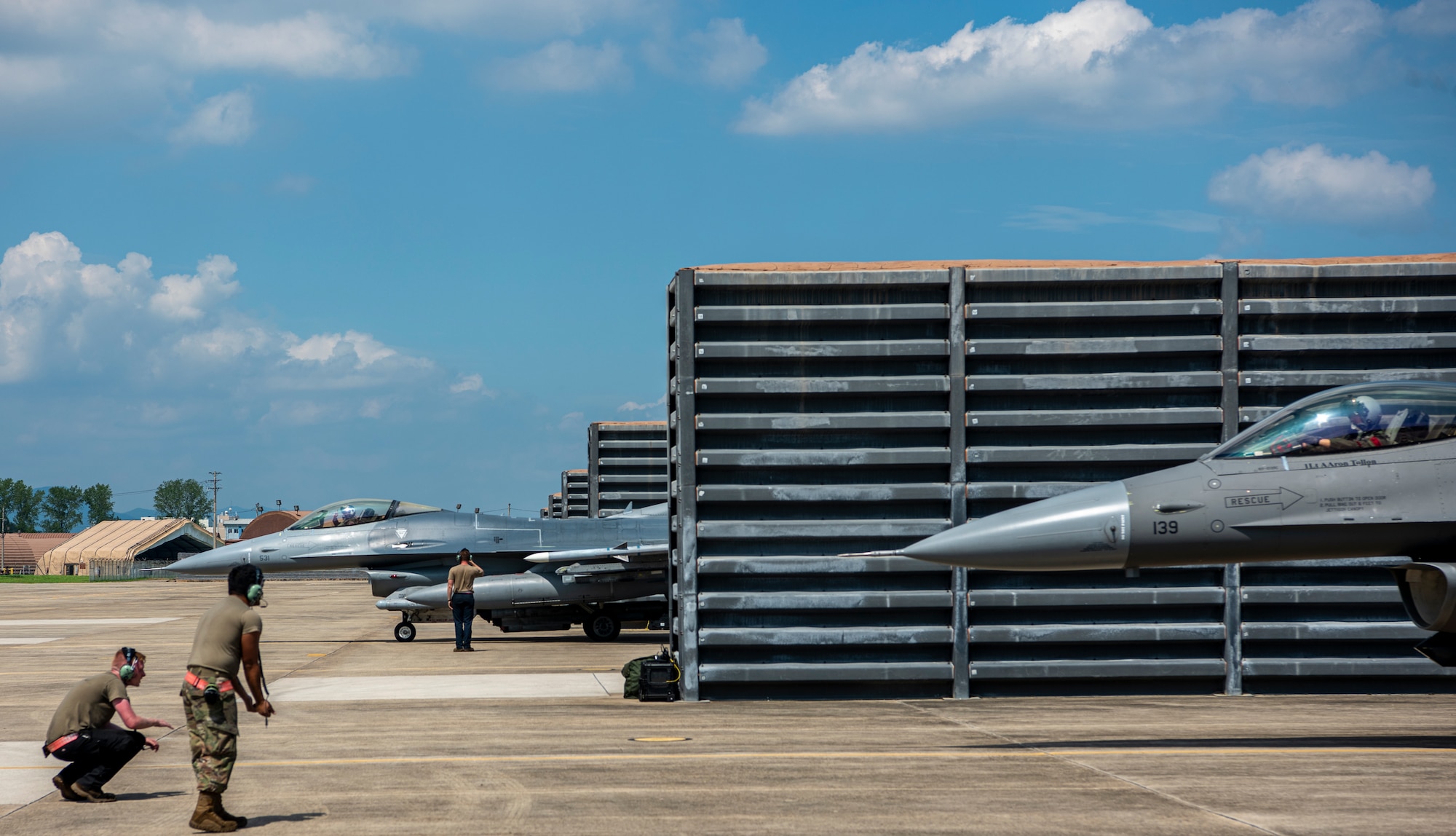 Airmen assigned to the 36th Fighter Generation Squadron perform pre-launch procedures with F-16 Fighting Falcon pilots during a training sortie at Gwangju Air Base, Republic of Korea, Aug. 18, 2022.