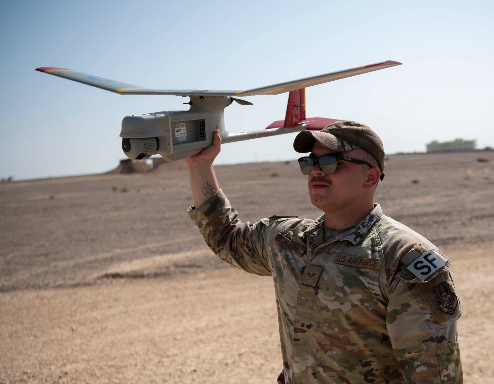 Staff Sergeant Braxton McHughes, 332d Expeditionary Security Forces Squadron, explains importance of reporting unauthorized small Unmanned Aerial Systems (sUAS) undisclosed location in Southwest Asia August 16, 2022. sUAS roles have expanded to include intelligence gathering, electronic attack, drone strikes, suppression or destruction of enemy air defense network node or communication relay, combat search and rescue. (U.S. Air Force video by Tech. Sgt. Jeffery Foster)