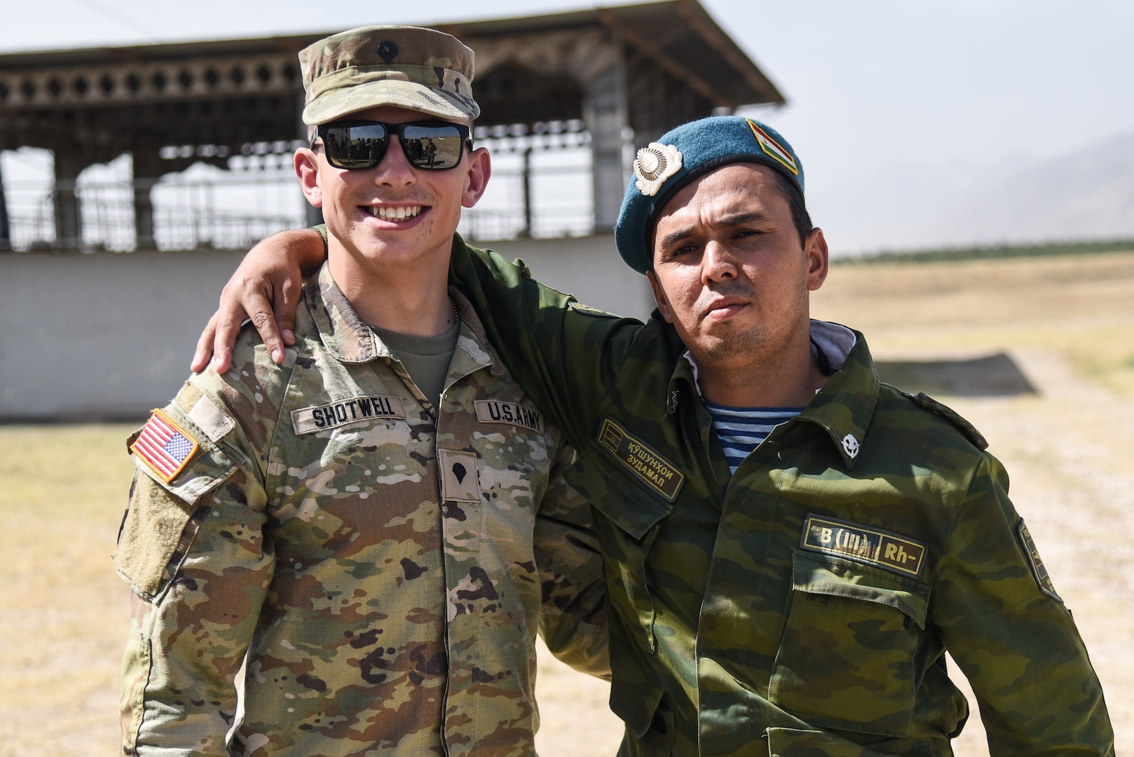 U.S. National Guard Soldiers pose alongside their partners from the Tajikistan Ministry of Defense during the exercise “Regional Cooperation 22” Aug. 14, 2022, at a training site near Dushanbe, Tajikistan. RC 22 is an annual, multi-national U.S. Central Command-sponsored exercise conducted by U.S. forces in partnership with Central and South Asia nations. (U.S. Army National Guard photo by Sgt. 1st Class Terra C. Gatti)