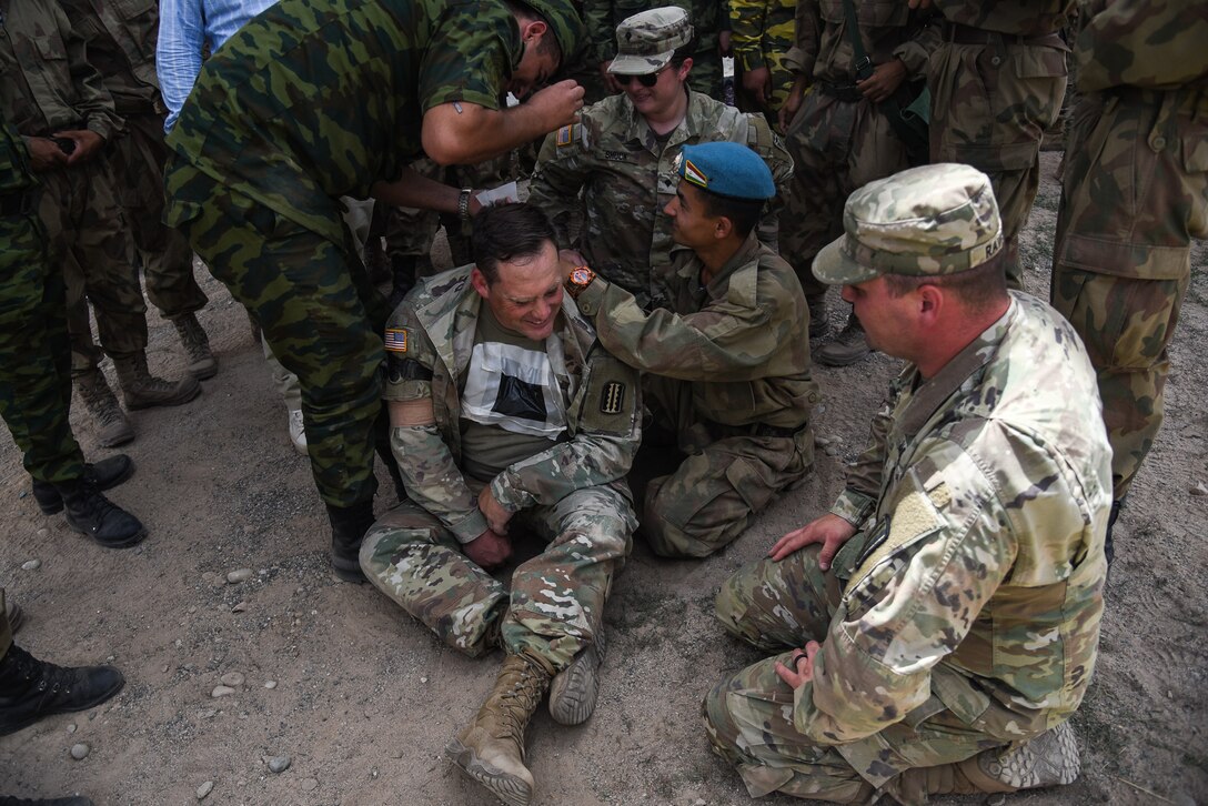 U.S. National Guard Soldiers from Virginia work through medical training lanes alongside their counterparts from the Tajikistan Ministry of Defense during the exercise “Regional Cooperation 22” Aug. 14, 2022, at a training site near Dushanbe, Tajikistan. RC 22 is an annual, multi-national U.S. Central Command-sponsored exercise conducted by U.S. forces in partnership with Central and South Asia nations. (U.S. Army National Guard photo by Sgt. 1st Class Terra C. Gatti)