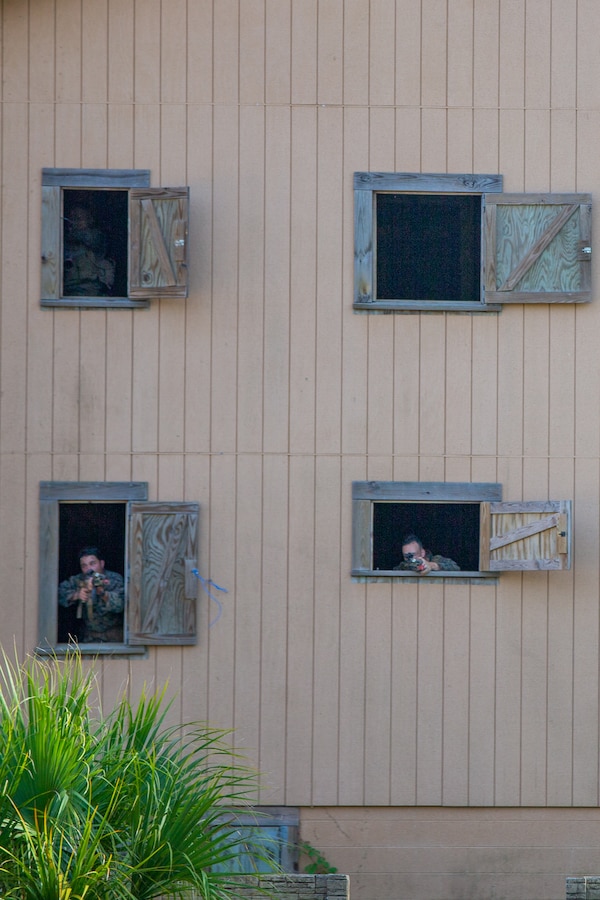 U.S. Marines with 2d Battalion, 2d Marine Regiment, 2d Marine Division, post security during Technology Operational Experimentation Exercise (TOEE) 22 on Camp Lejeune, North Carolina, July 28, 2022.