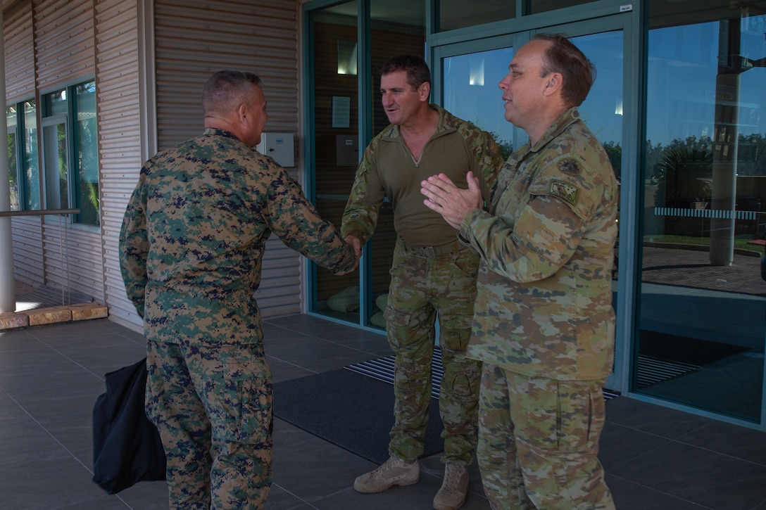 U.S. Marine Corps Lt. Gen. Stephen Sklenka, deputy commander of U.S. Indo-Pacific Command, meets with Australian Army Warrant Officer Class One Brad Doyle, the regimental sergeant major of 1st Brigade, and Australian Army Brig. Gen. Nicholas Foxall, the commanding officer of 1st Brigade, at Robertson Barracks, NT, Australia, Aug. 25, 2022. U.S. INDOPACOM and Marine Corps Forces Pacific deputy commanders toured the Australian Army 1st Brigade headquarters during their visit in Darwin.