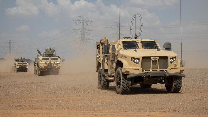 U.S. Marines with Combat Logistics Regiment 1, 1st Marine Logistics Group, stage their vehicles after the completion of the first leg of a convoy at a combat support center established in Kingdom of Saudi Arabia during exercise Native Fury 22, Aug. 14, 2022. Native Fury 22 is vital for strengthening the U.S. long-standing relationship with Saudi Armed Forces. The exercise enhances combined tactics, maritime capabilities and promotes long-term regional stability. (U.S. Marine Corps photo by Cpl. Casandra Lamas)