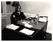 BMC Maxie Berry, USCG, at his desk at Pea Island Life-Saving Station.