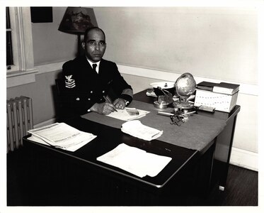 BMC Maxie Berry, USCG, at his desk at Pea Island Life-Saving Station.