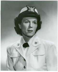 Portrait photograph of Edith Munro, SPAR, who enlisted after her son, Signalman 1c Douglas Munro was killed-in-action on Guadalcanal.