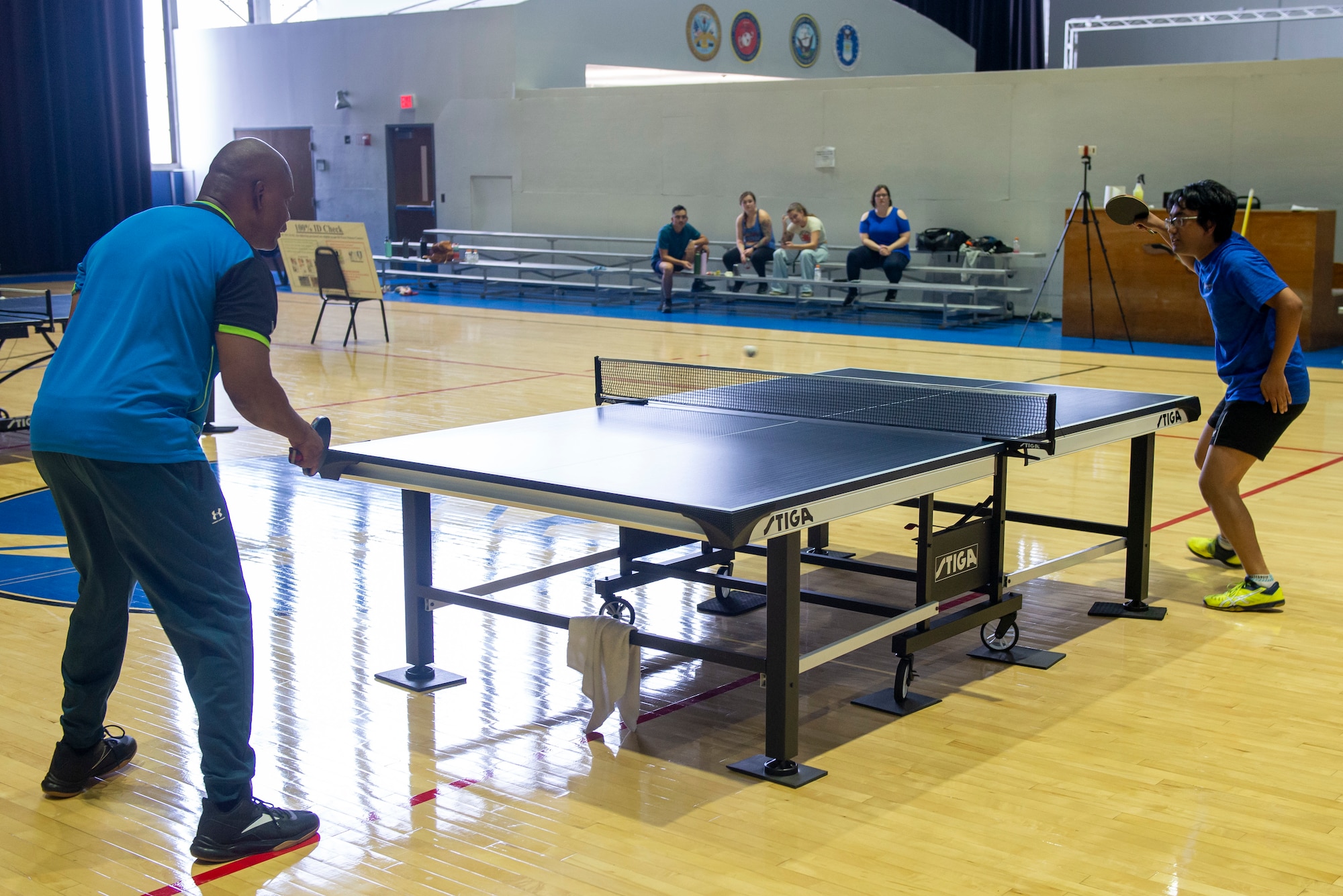 Participants face off in the Ping-Pong tournament finals.