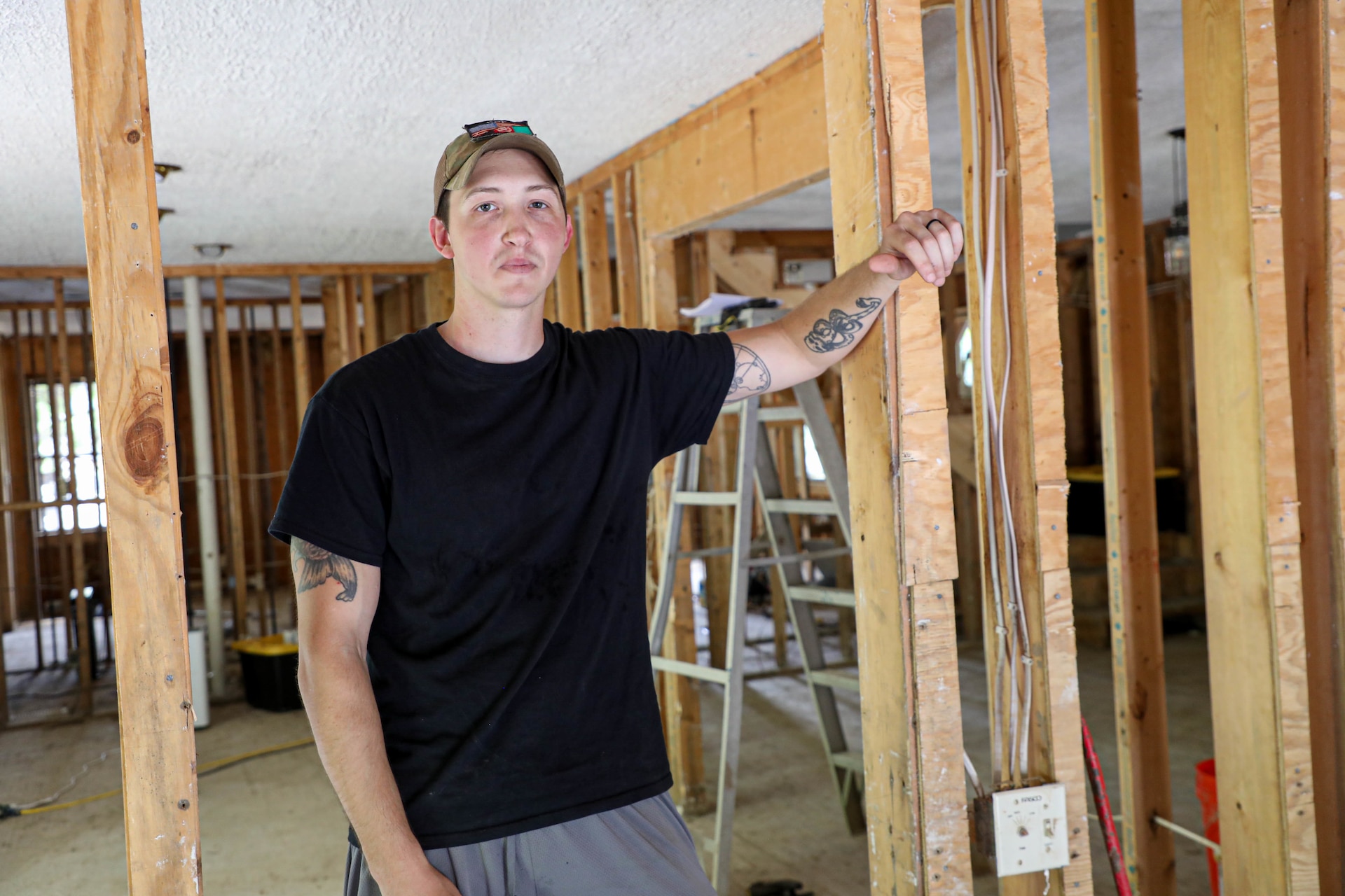 Hall watched rushing flood waters rise and destroy the first story of his house from a hill behind his home which sits about 20 yards from Troublesome Creek.