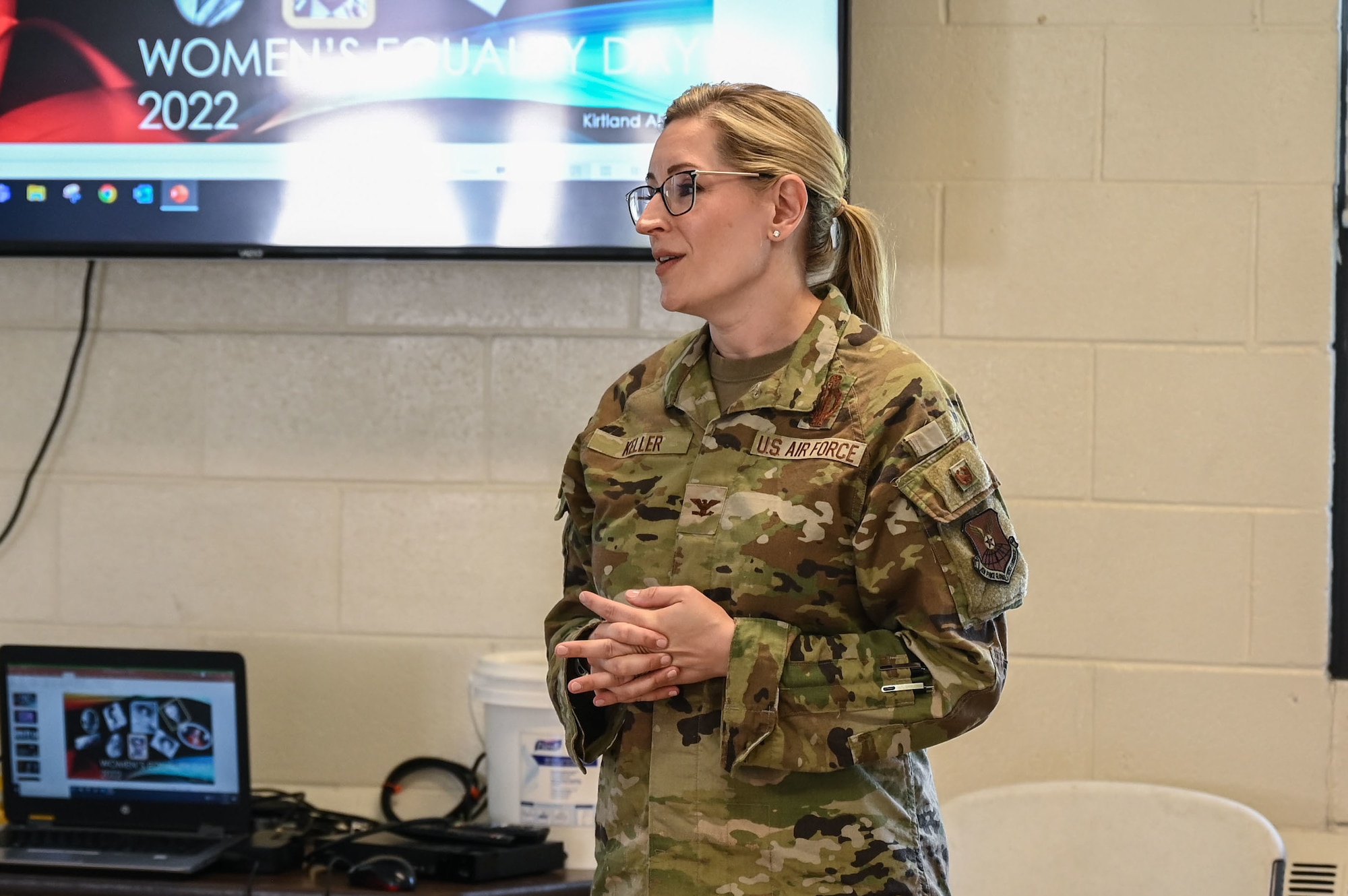 A woman gives a speech.