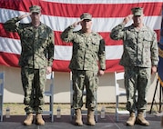 rospective commanding officer, Explosive Ordnance Disposal Training and Evaluation Unit (EODTEU) 2, Cmdr. Paul Mahoney; Cmdr. Douglas Alley, commander, EODTEU 2; and Capt. Chuck Eckhart, commodore, Explosive Ordnance Disposal Group (EODGRU) 2, render salutes as they await the color guard to post the colors and begin their change of command ceremony.