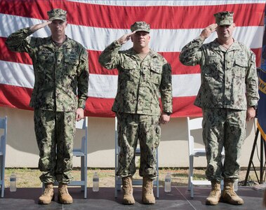 rospective commanding officer, Explosive Ordnance Disposal Training and Evaluation Unit (EODTEU) 2, Cmdr. Paul Mahoney; Cmdr. Douglas Alley, commander, EODTEU 2; and Capt. Chuck Eckhart, commodore, Explosive Ordnance Disposal Group (EODGRU) 2, render salutes as they await the color guard to post the colors and begin their change of command ceremony.