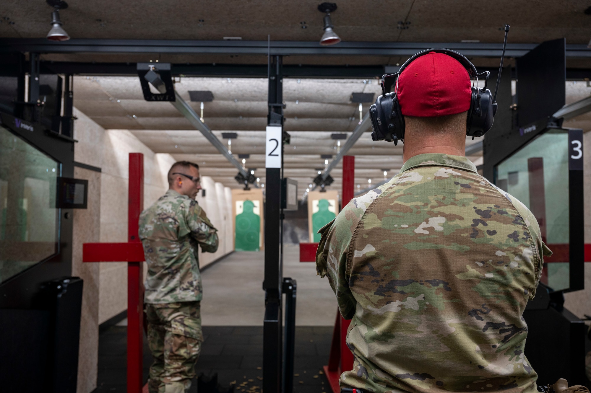 Man observes a firing range