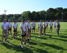 GREAT LAKES, Ill. (Aug. 24, 2022) Rear Adm. Pete Garvin, right, commander, Naval Education and Training Command (NETC), talks with Navy special operations candidates after they completed a 3-mile run at Center for Explosive Ordnance Disposal and Diving (CEODD) in Great Lakes, Illinois, Aug. 24, 2022. The learning site runs two courses of instruction for explosive ordnance disposal (EOD), Navy diver (ND) and diving medical technician (DMT) candidates.  The 18-day preparatory course is designed to prepare Sailors for EOD and ND “A” schools by providing training and mentoring in entry-level aquatic adaptability and physical and mental conditioning.  The 22-day Assessment and Selection Course is designed to prepare the most qualified EOD and ND candidates for a career in the Navy’s special operations community. As the owner of the Force Development pillar within MyNavy HR, Garvin leads the NETC mission to recruit, train and deliver those who serve the nation, taking them from “street to fleet” by transforming civilians into highly skilled, operational and combat ready warfighters. (U.S. Navy photo by Matt Mogle)