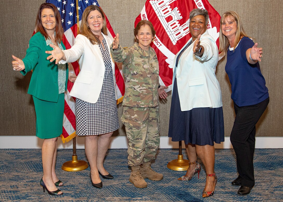 Memphis District Trailblazers: District Counsel Suzy Weil, Engineering and Construction Division Chief Elizabeth Burks, Mississippi Valley Division Commander Maj. Gen. Diana Holland, Operations Division Chief Andrea Williams, and Chief of RCO/Emergency Management (EM) Kandita “Kandi” H. Waller pose for a photo during a town hall gathering in June of 2022.