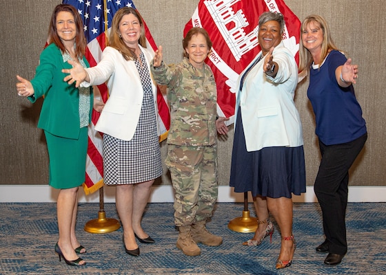 Memphis District Trailblazers: District Counsel Suzy Weil, Engineering and Construction Division Chief Elizabeth Burks, Mississippi Valley Division Commander Maj. Gen. Diana Holland, Operations Division Chief Andrea Williams, and Chief of RCO/Emergency Management (EM) Kandita “Kandi” H. Waller pose for a photo during a town hall gathering in June of 2022.