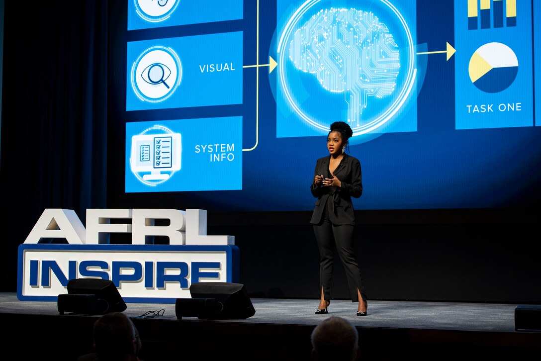 Dr. Jayde King, a research psychologist from the Air Force Research Laboratory’s 711th Human Performance Wing, discusses futuristic scenarios of human-machine teaming during her AFRL Inspire talk. AFRL hosted this special TEDx-style event at the Air Force Institute of Technology's Kenney Hall at Wright-Patterson Air Force Base, Aug. 23, 2022. (U.S. Air Force photo / Rick Eldridge)