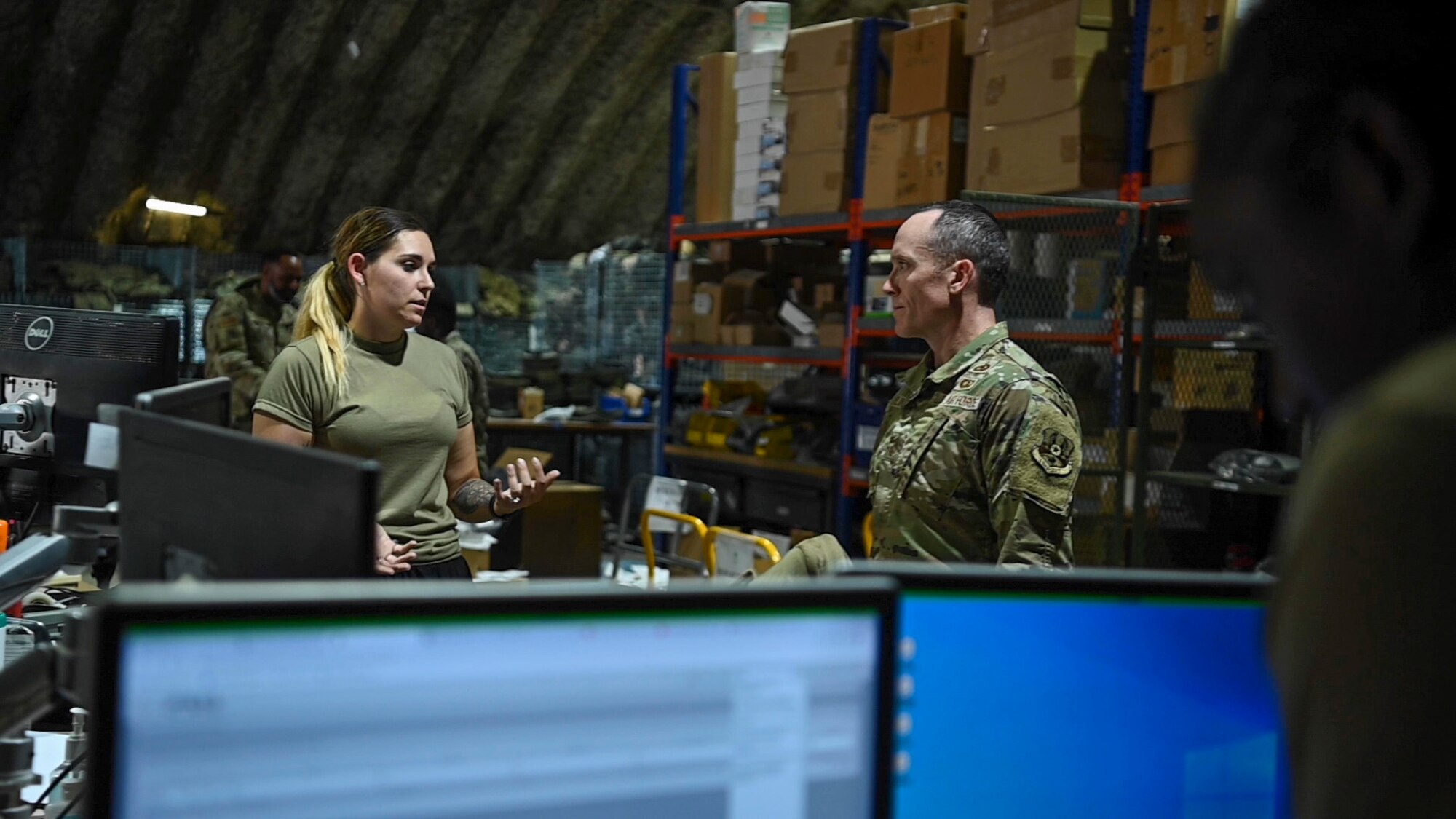 U.S. Air Force Chief Master Sgt. Kevin Eberlin, 332d AEW command chief, visited with team members from the 332d Expeditionary Logistics Readiness Squadron, Materiel Management at an undisclosed location in Southwest Asia August 13, 2022. These immersion visits provide greater insight into the unique skillsets every Airman brings to the 332d AEW Red Tail team. (U.S. Air Force photo by 1st Lt. Michael Luangkhot)