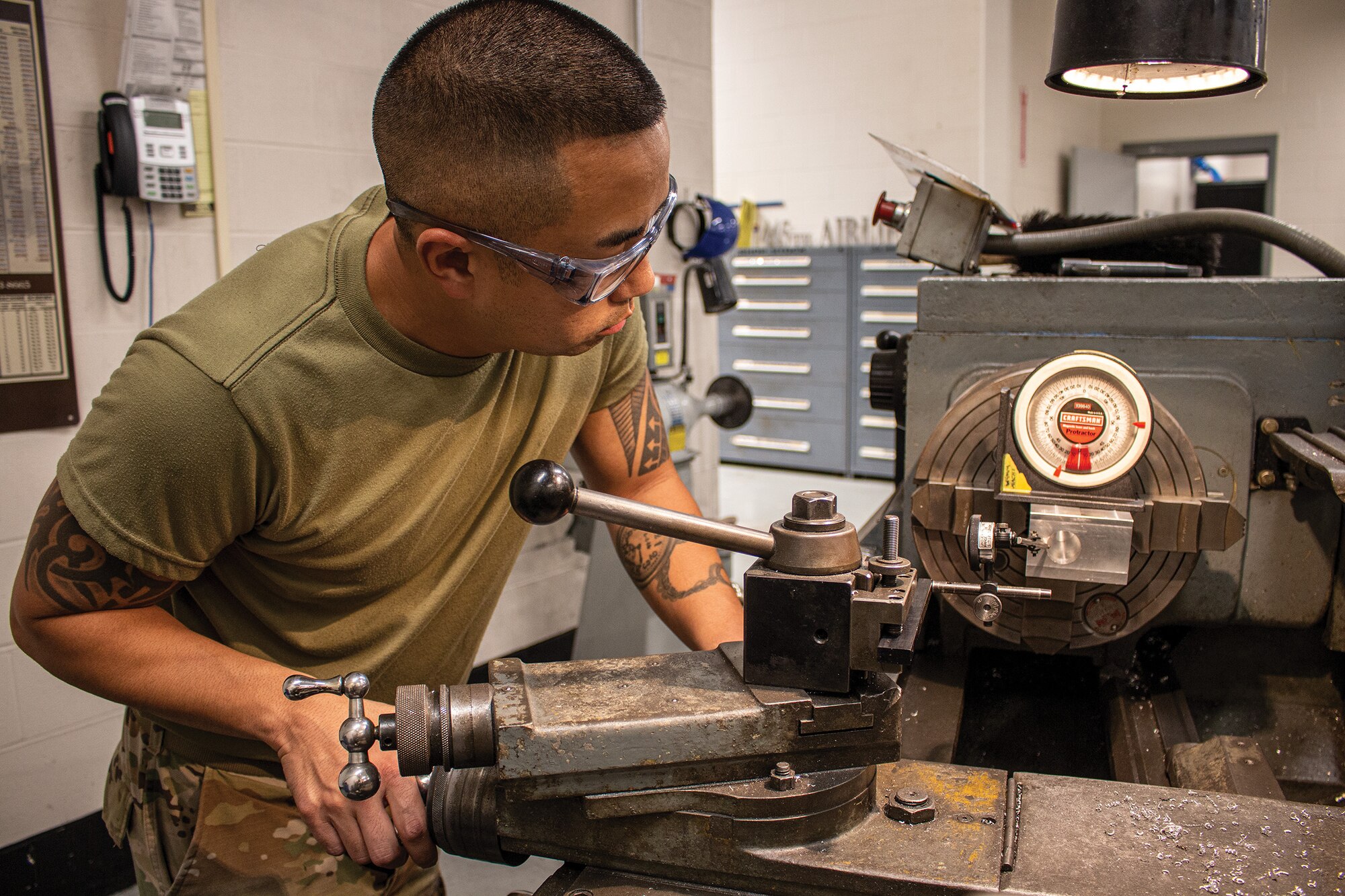 Staff Sgt. Daniel Harner, 445th Maintenance Squadron metals technology craftsman, measures equipment before fabricating a high-pressure manifold for a C-17 Globemaster III, Aug. 7, 2022. Precision in this process is key as this part regulates the immense hydraulic pressure needed to safely operate hydraulic lifts. During the fabrication process, the measurements must be exact for the part to function as intended.