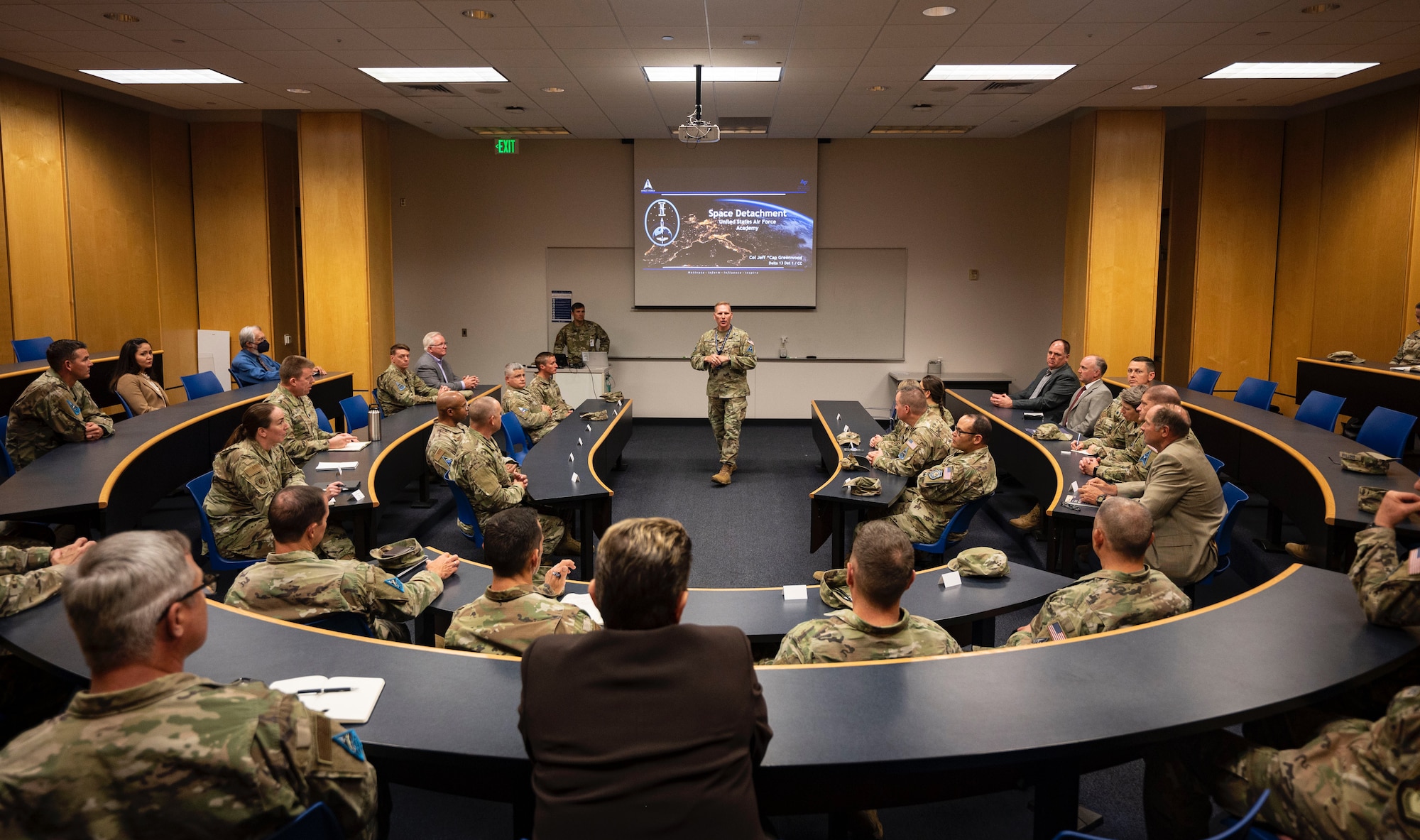 Space Training and Readiness Command senior leaders receive a briefing from Col. Jeffrey Greenwood, Space Delta 13 Detachment 1 commander, during a conference at the U.S. Air Force Academy