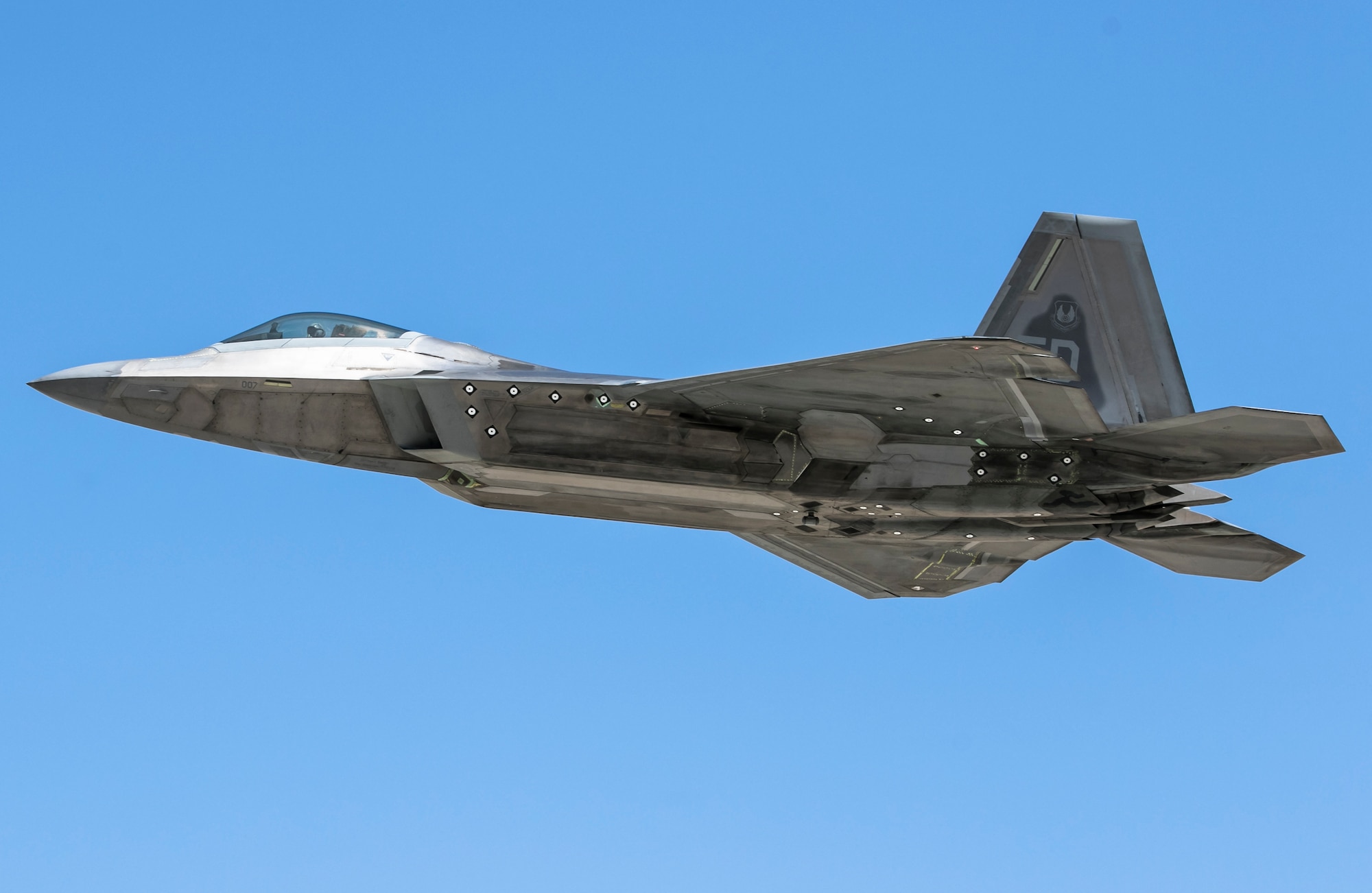 An F-22 Raptor from the 411th Flight Test Squadron, 412th Test Wing, flies over Edwards Air Force Base, California, Aug. 23. (Air Force photo by Chase Kohler)