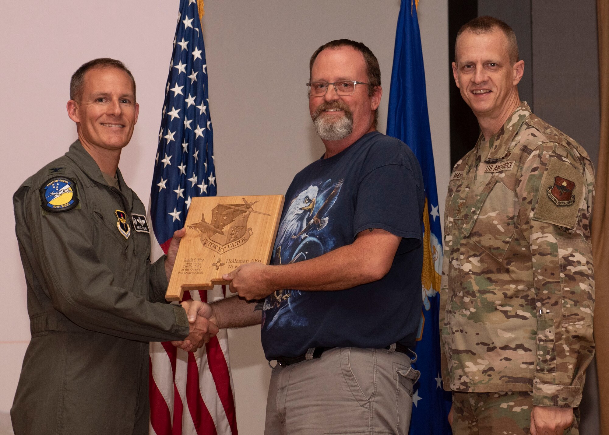 Ronald Wing, from the 49th Logistics Readiness Squadron, accepts the Civilian Category I (Supervisory) of the Quarter award during the 49th Wing’s 2nd quarter award ceremony, Aug. 29, 2022, at Holloman Air Force Base, New Mexico. Quarterly award winners were selected based on their technical expertise, demonstration of leadership and job performance. (U.S. Air Force photo by Airman 1st Class Nicholas Paczkowski)