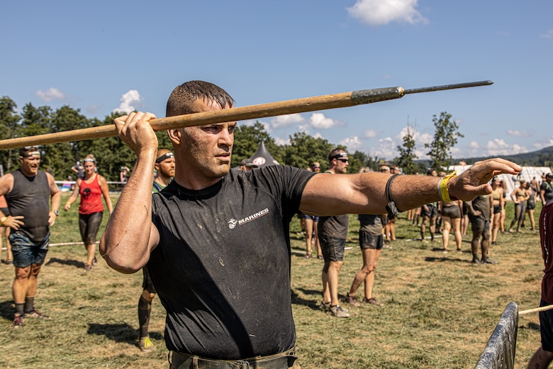 U.S. Marine Corps Lance Cpl. Stephen Thrush, administrative specialist, Marine Corps Recruiting Command, prepares to throw a javelin at the Sprint 5K at the 2022 West Virginia Spartan Trifecta Weekend Event in Glen Jean, West Virginia, Aug. 28, 2022.  Marine Corps Recruiting Command has partnered with the Spartan Race and their community of Athletes during 2022 through National and local level event activations. The partnership celebrates athletes' discipline, fighting spirit, and will to overcome obstacles and complete the mission are values shared with the Corps.  (U.S. Marine Corps photo by Lance Cpl. Gustavo Romero)
