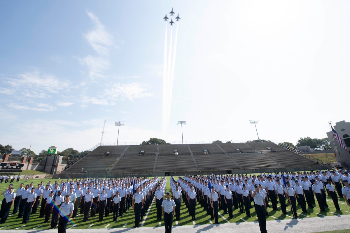 The U.S. Air Force Thunderbirds perform a fly-over the Cramton Bowl stadium during the Officer Training School parade and graduation of class 19-07 Sept. 27, 2019, Montgomery, Alabama.