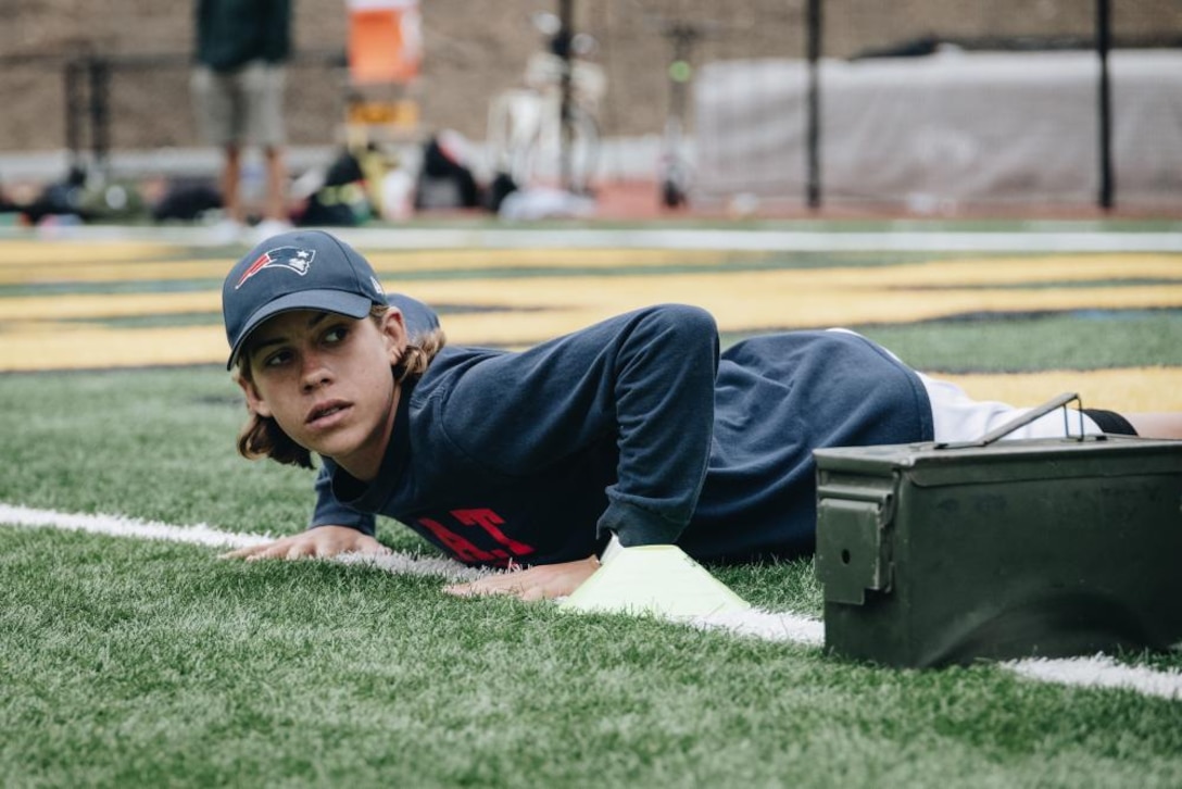 Luke Griffin, a student with Harbor High School, prepares to conduct the Maneuver Under Fire portion of the Combat Fitness Test (CFT) in Santa Cruz, California, July 21, 2022. The Marines conduct the CFT with high school students to give them insight into the physical training and discipline that is necessary to hold the Marine Corps standard. (U.S. Marine Corps photo by Sgt. Alina Thackray)