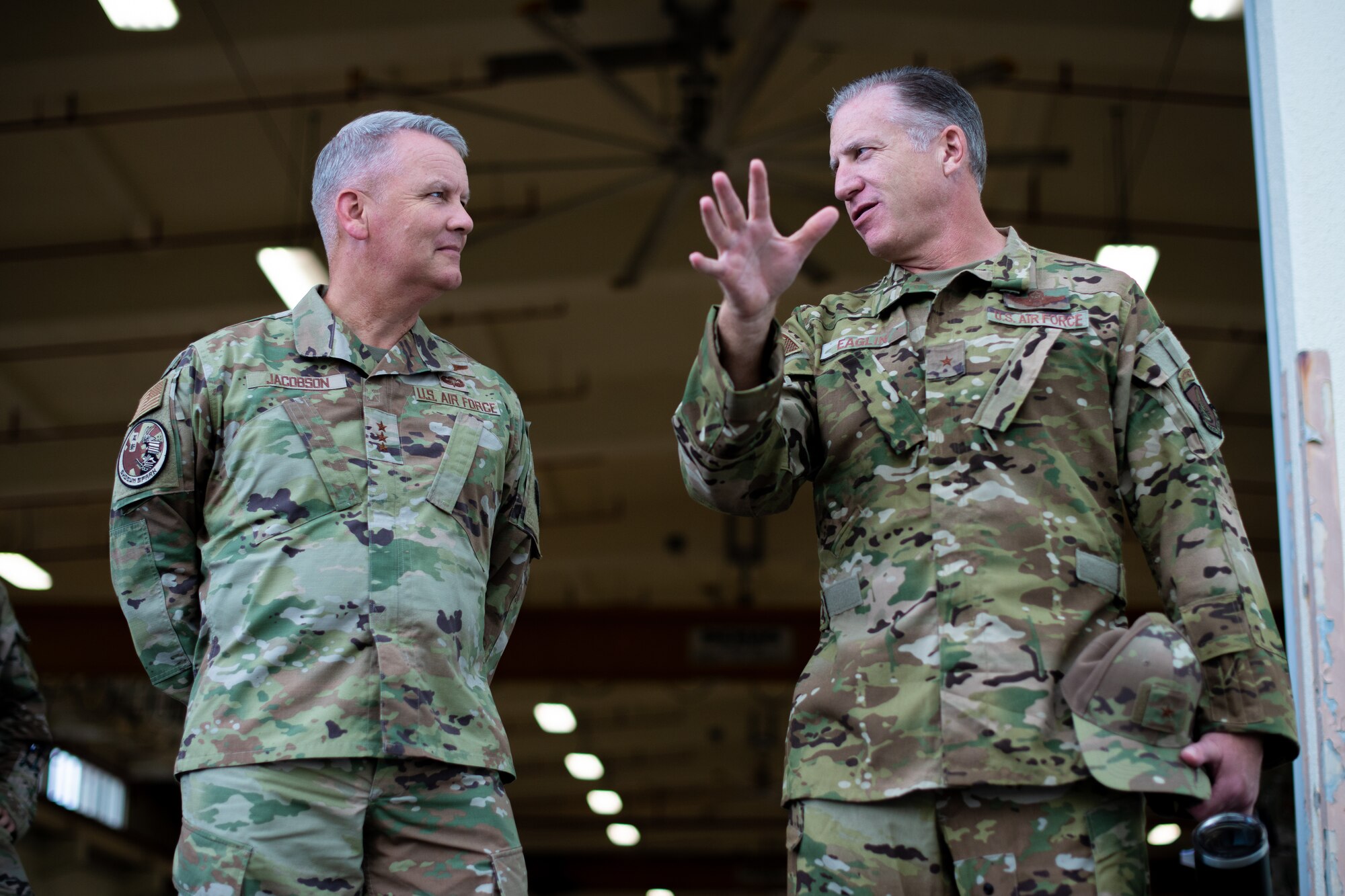 Airmen talk about a facility.