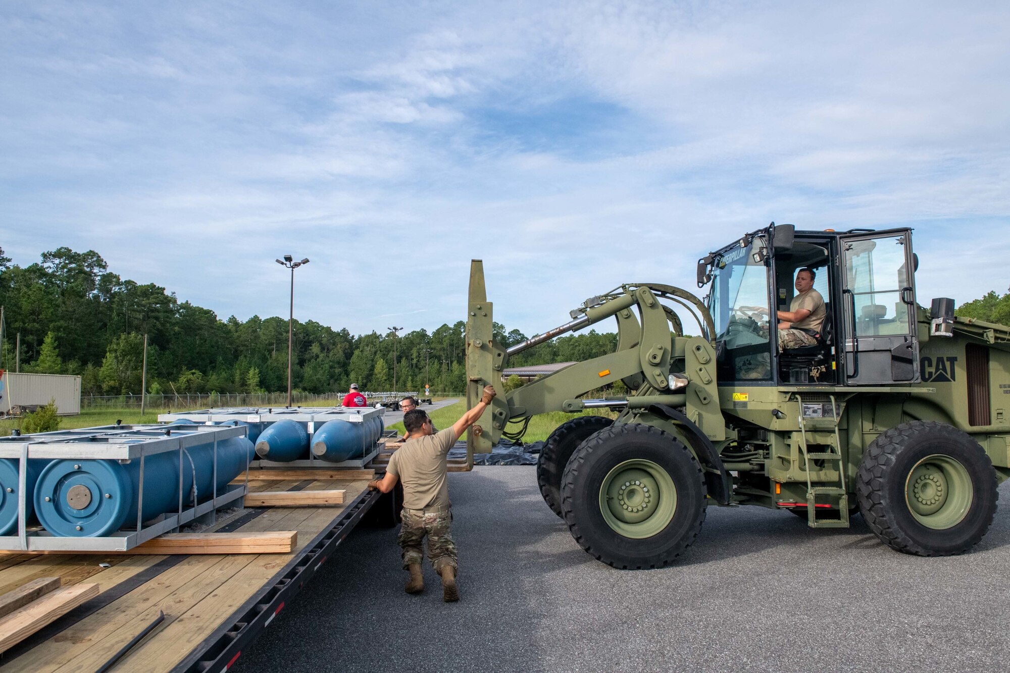 Inert general purpose bombs, called MK-84s, arrive at the 125th Fighter Wing, Florida Air National Guard, Aug. 24, 2022. The assets are the first tangible indication of the Wing's upcoming F-35 conversion and enable members to begin preparing for first aircraft arrival. (U.S. Air National Guard photo by Tech Sgt. Chelsea Smith)
