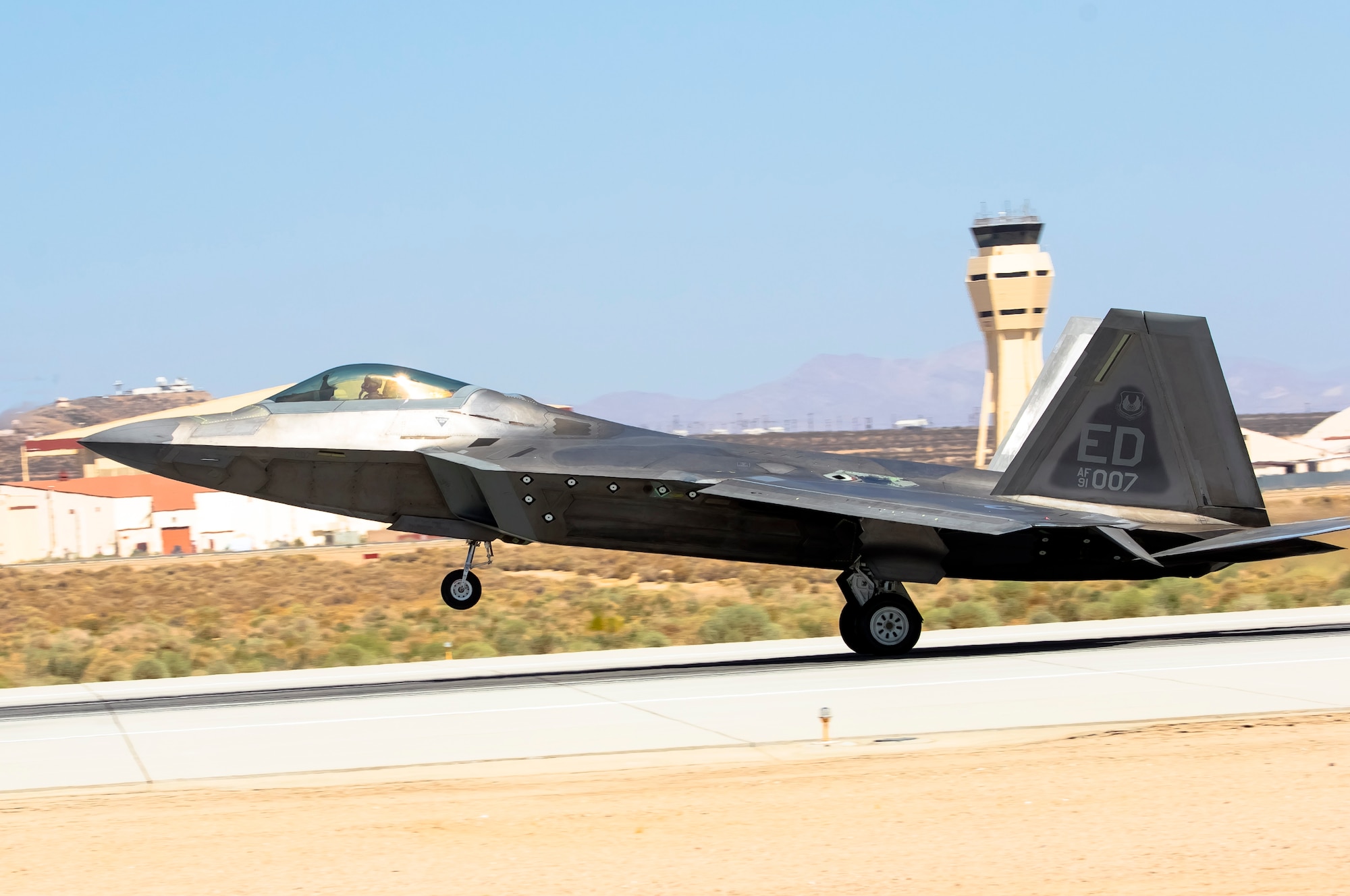 An F-22 Raptor from the 411th Flight Test Squadron, 412th Test Wing, takes off from Edwards Air Force Base, California, Aug. 23. (Air Force photo by Chase Kohler)