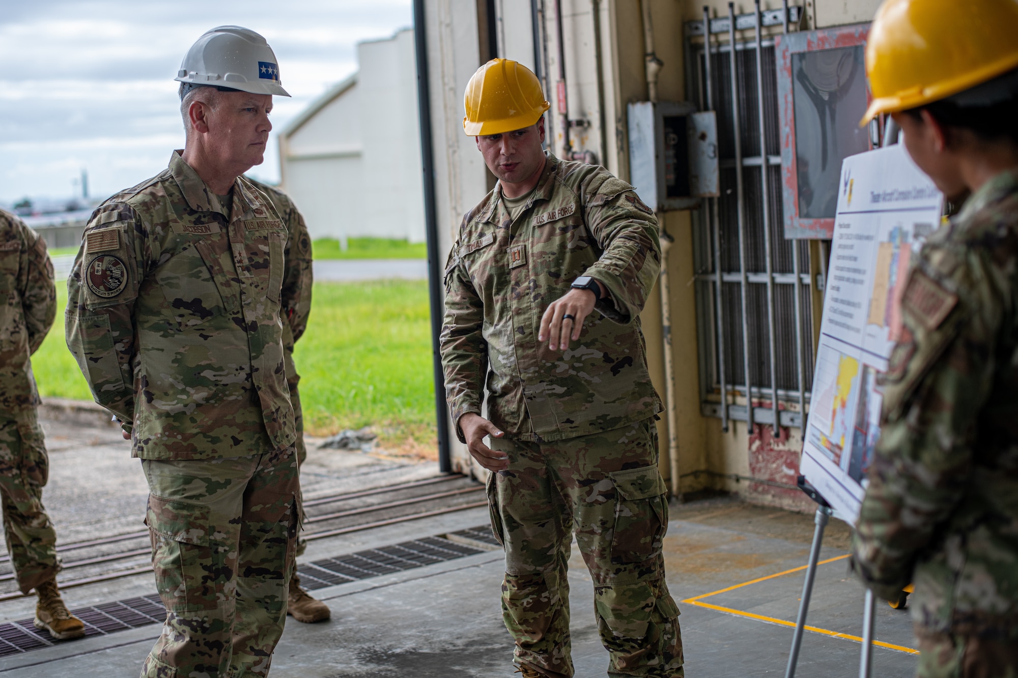 Airmen talk about a facility.