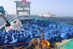 GULF OF OMAN (Aug. 30, 2022) Bags of illegal narcotics sit on the deck of a fishing vessel interdicted by U.S. Coast Guard fast response cutter USCGC Glen Harris (WPC 1144) in the Gulf of Oman, Aug. 30.