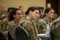 Airmen listen to panelists.