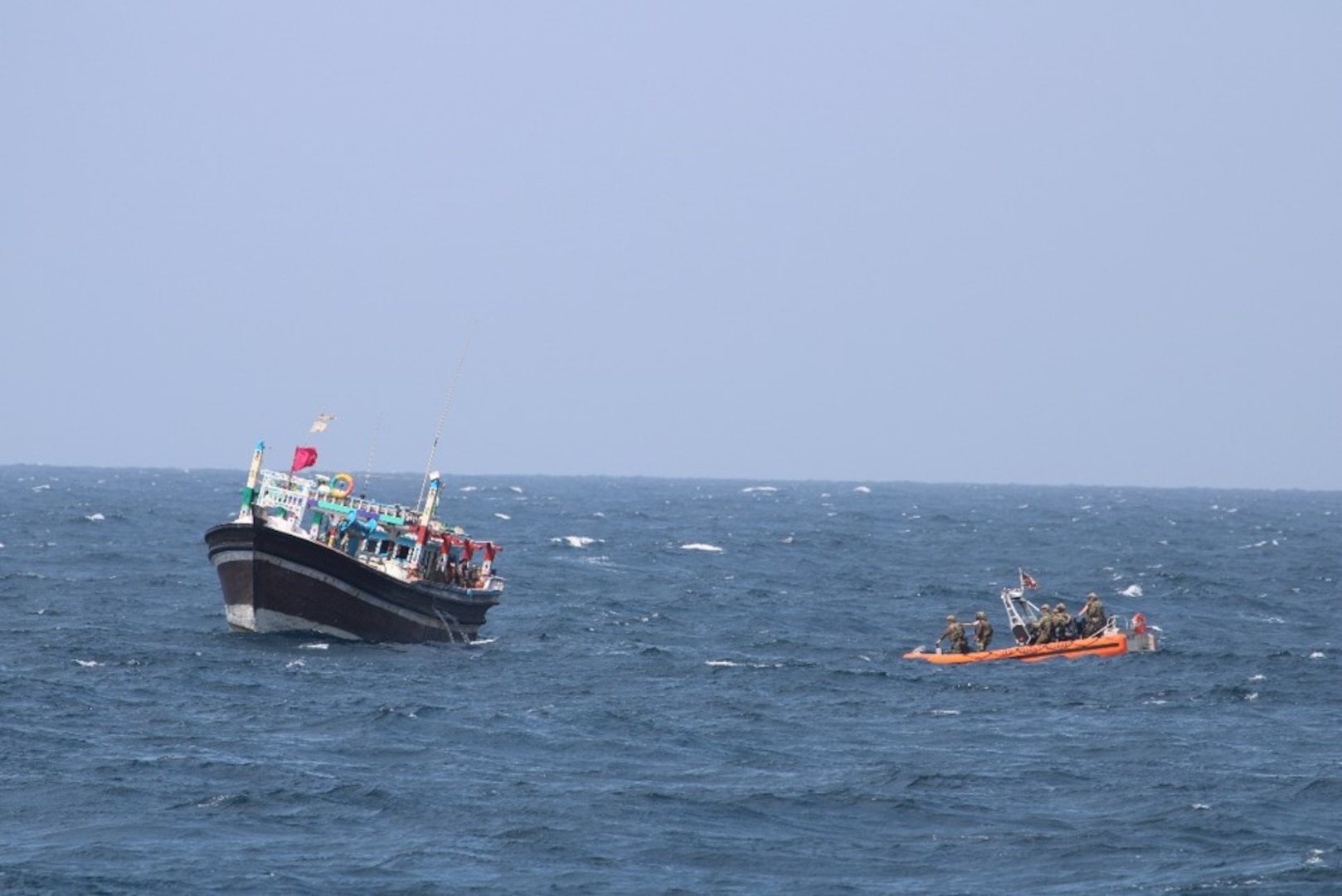 GULF OF OMAN (Aug. 30, 2022) Personnel from U.S. Coast Guard fast response cutter USCGC Glen Harris (WPC 1144) interdict a fishing vessel smuggling illegal narcotics in the Gulf of Oman, Aug. 30.