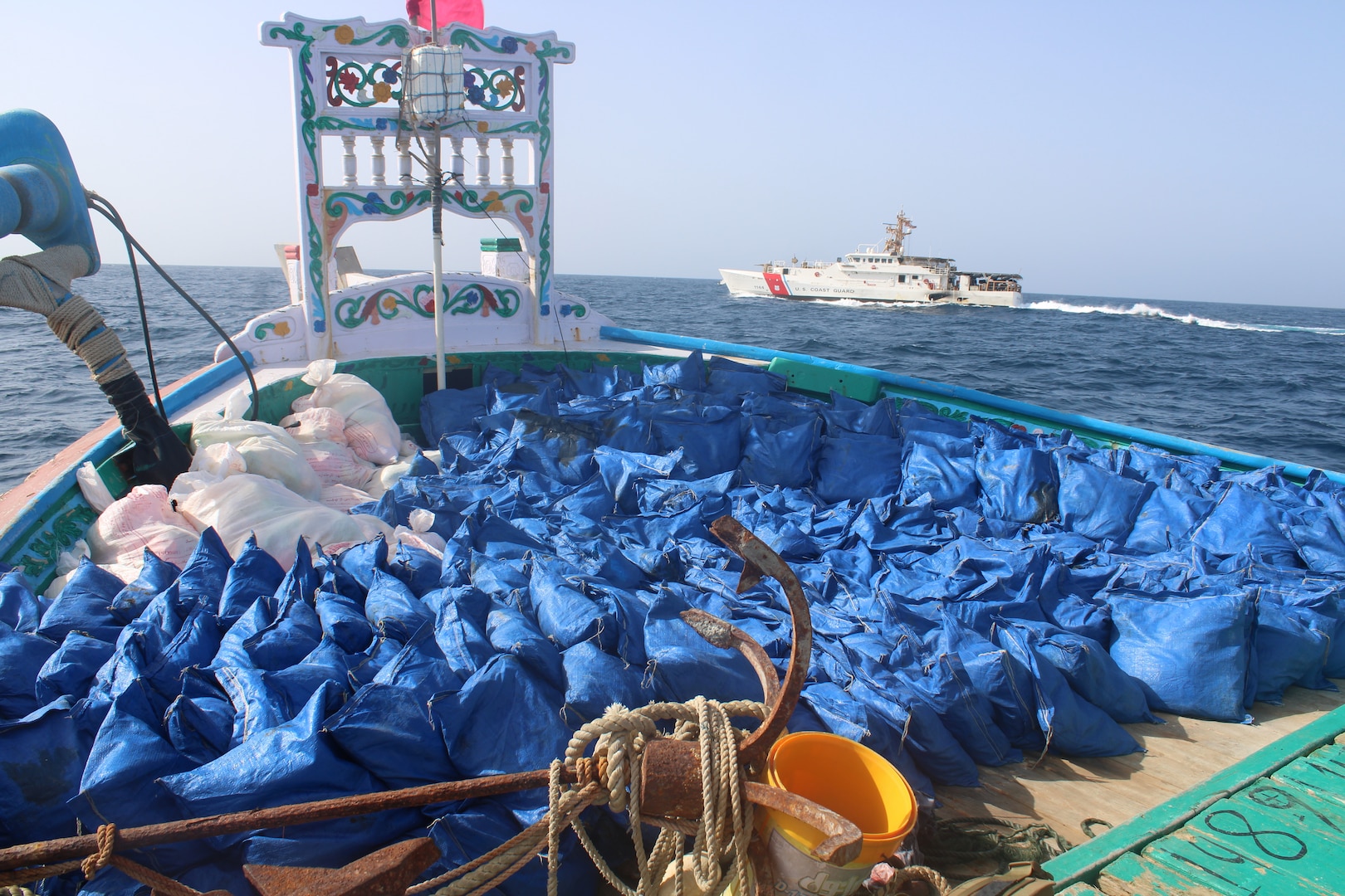 GULF OF OMAN (Aug. 30, 2022) Bags of illegal narcotics sit on the deck of a fishing vessel interdicted by U.S. Coast Guard fast response cutter USCGC Glen Harris (WPC 1144) in the Gulf of Oman, Aug. 30.