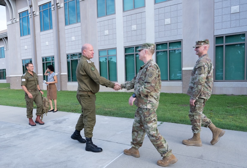 U.S. Army Central's commanding general, Lt. Gen. Patrick Frank, greets Maj. Gen. Hidai Zilberman, Israeli Defense and Armed Forces Attaché to the United States, at USARCENT Headquarters, Shaw AFB, August 31, 2022.