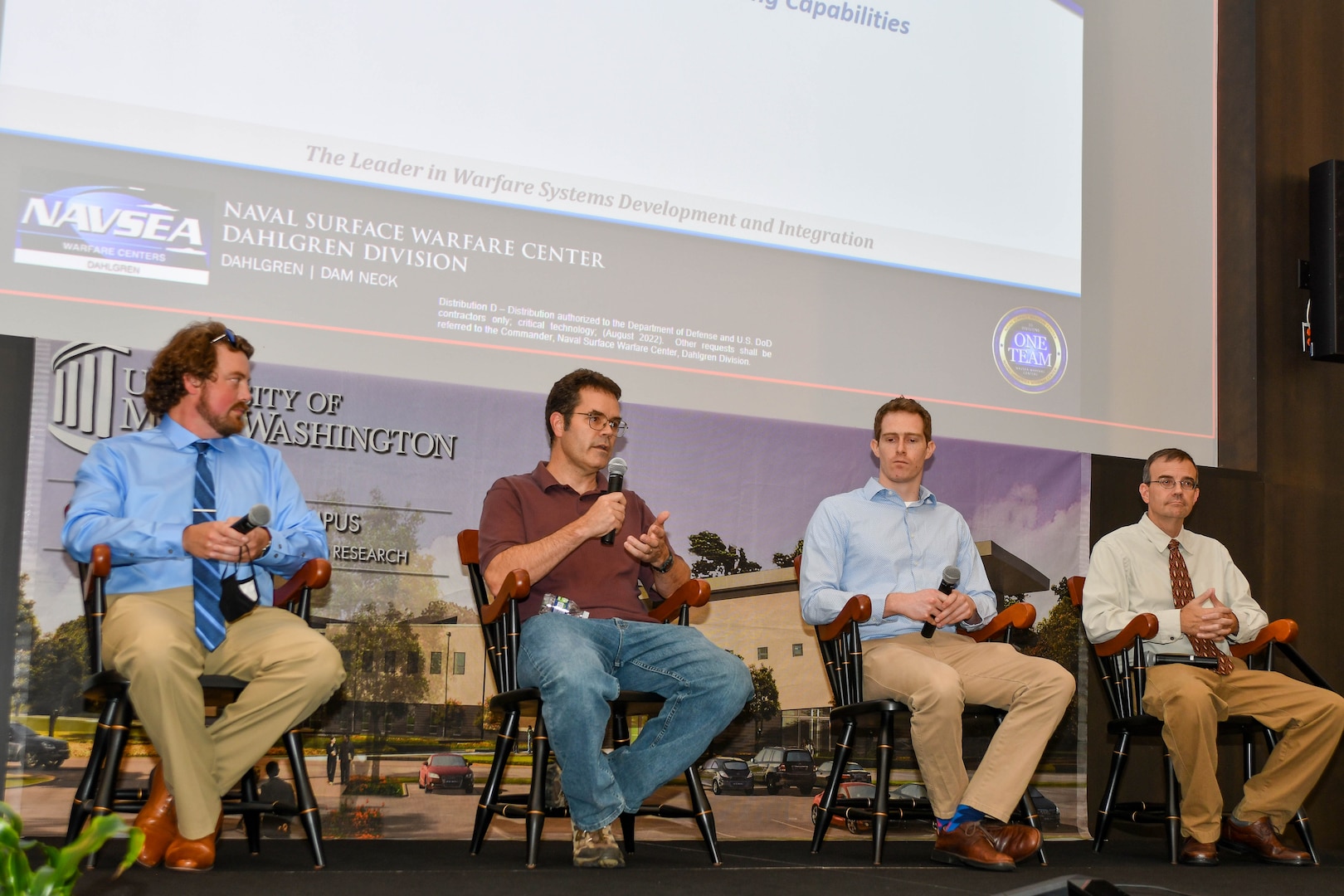 IMAGE: From left to right, Dr. Chris Wilson, Ryan Bosely, Greg Ryan and Mike Hopson discussed internal investments and advancing capabilities during the second day of Naval Surface Warfare Center Dahlgren Division’s fourth annual Modeling and Simulation Summit at the Dahlgren Campus of the University of Mary Washington.