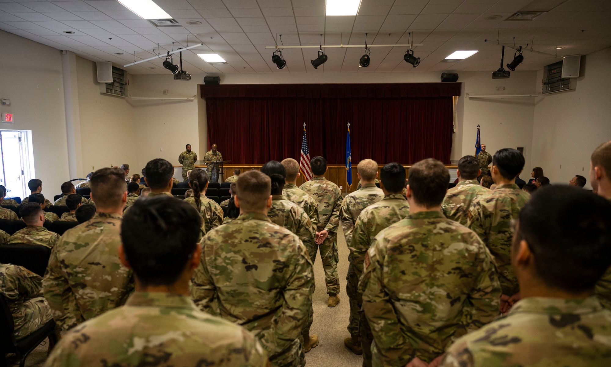 U.S. Airmen with the 627th Air Base Group, and their families, gather for the 627th Communications Squadron assumption of command ceremony at Joint Base Lewis-McChord, Washington, Aug. 26, 2022. U.S. Air Force Lt. Col. Kristina Dempsey assumed command of the 627th CS; responsible for providing world-class communications support which enables mission partner success across JBLM. (U.S. Air Force photo by Staff Sgt. Rachel Williams)