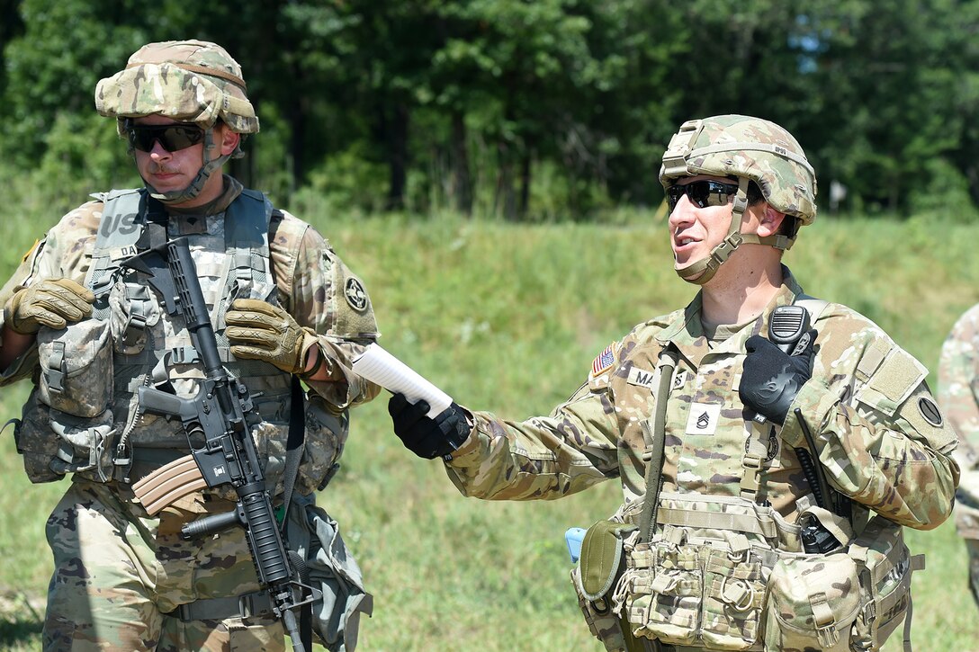 Sgt. 1st Class Steven Masters, Observer Coach/Trainer, 2-361st Training Support Battalion, 85th U.S. Army Reserve Support Command, based in Sioux Falls, South Dakota, comments on lanes training during CSTX 86-22-02 at Fort McCoy, Wisconsin, August 16, 2022.