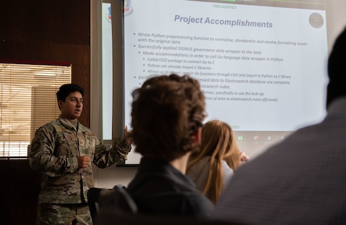 U.S. Air Force Academy Cadet briefs their project's status