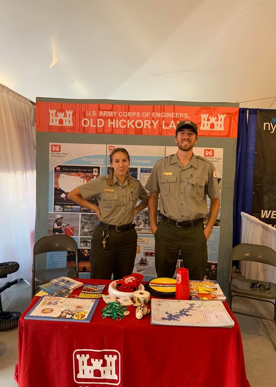 J. Percy Priest Lake Park Rangers Ali Battaglia and Andrew Harrell greet Wilson County Fair attendees and spread the importance of water safety by giving out informative pamphlets, maps, and water safety bags. The Wilson County Fair was held in Lebanon, Tennessee, from Aug. 18-26, 2022. (USACE Photo)