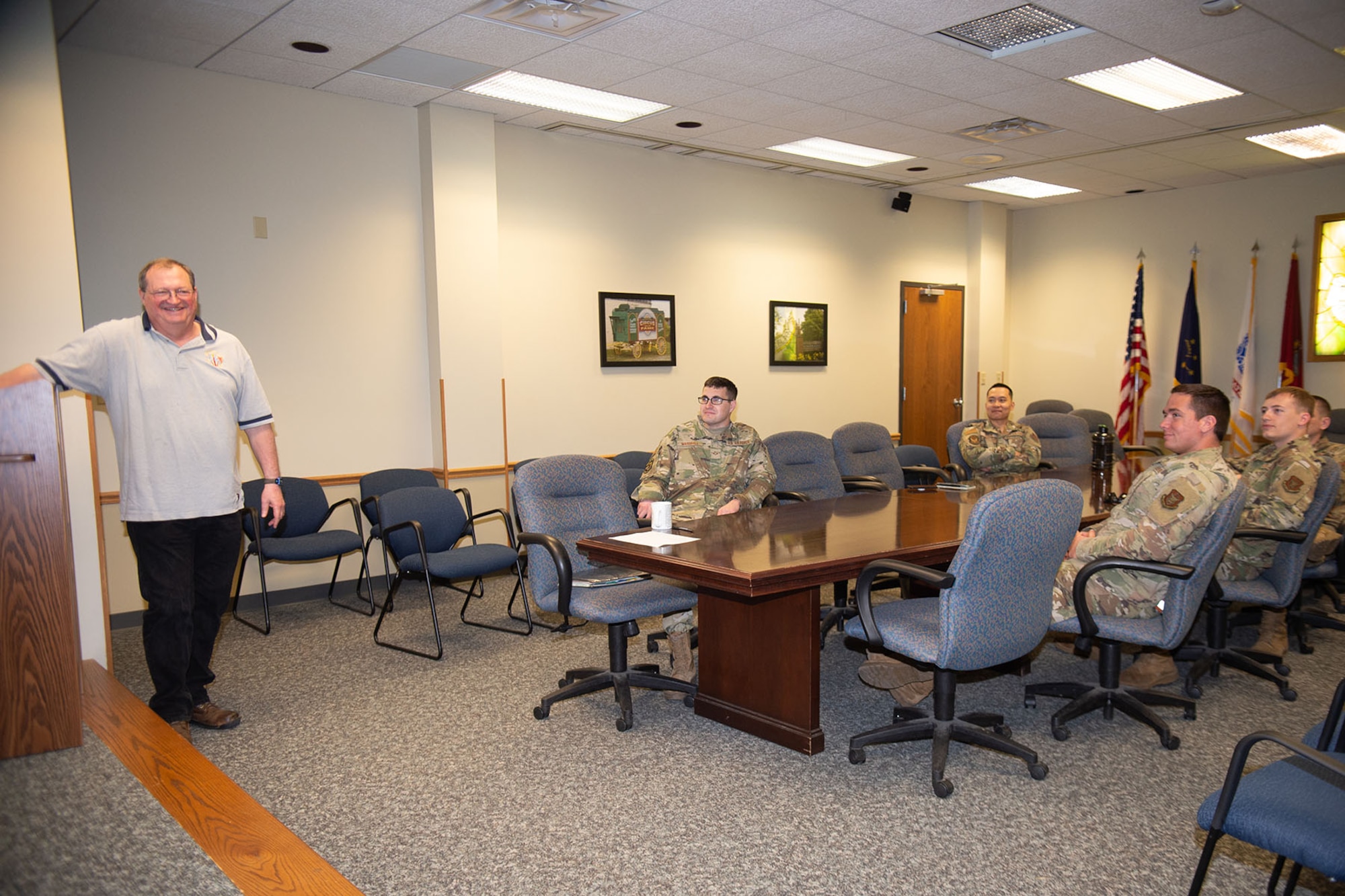 Bryan Runion, 434th Air Refueling Wing Process Manager, briefs a group of Airmen on the spark cell currently in development at Grissom Air Reserve Base, Ind. The spark cell is an innovation center run by volunteers, which is geared toward furthering innovative ideas that Grissom Team members can implement with high efficiency in a cost effective environment, in order to benefit the Air Force mission. (U.S. Air Force photo by Master Sgt. Rachel Barton)