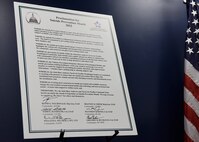 A signed proclamation to designate September as Suicide Prevention Month sits on display at Joint Base Andrews, Md., Aug. 31, 2022. Though suicide prevention is emphasized in September, it is a Department of Defense priority throughout the year. The DoD is fully committed to preventing suicide among service members, veterans, and their families. (U.S. Air Force photo by Airman 1st Class Austin Pate)