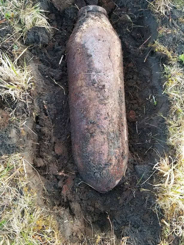As a crew for the U.S. Army Corps of Engineers worked to clear buried munitions from the Fort Glenn Formerly Used Defense Site on Umnak Island in the summer of 2020, it unexpectedly discovered a 500-pound bomb. The following year, the team returned to the project site in remote Alaska with a remote-controlled excavator to safely neutralize the explosive device along with three others of the same size. (U.S. Army Photo)